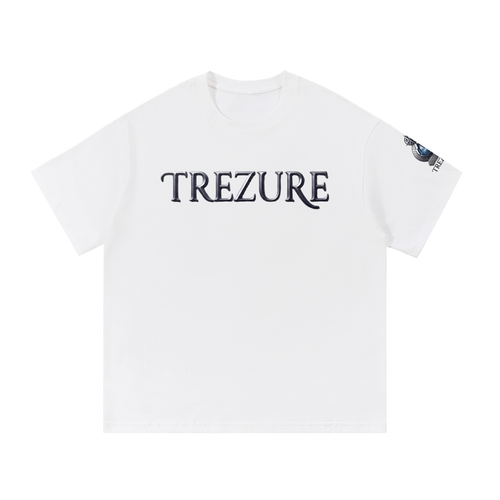 A white short-sleeve crewneck t-shirt featuring the word 'TREZURE' printed across the chest in a dark navy serif font. A small graphic is visible on the left sleeve.